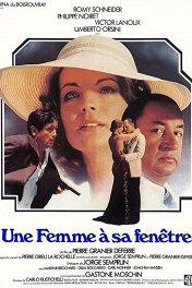 Женщина в своем окне / Une femme à sa fenêtre